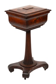 MAHOGANY AND MAHOGANY VENEER FLOOR-STANDING TEA CADDY Early 19th Century Height 30.5". Width 16".