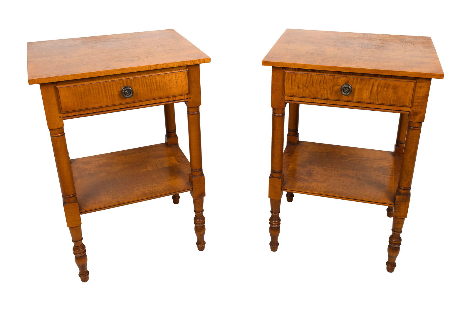 PAIR OF ELDRED WHEELER TIGER MAPLE ONE-DRAWER STANDS Massachusetts, 20th Century Heights 29". Widths: PAIR OF ELDRED WHEELER TIGER MAPLE ONE-DRAWER STANDSMassachusetts, 20th CenturyTurned legs support a low shelf. Original label inside drawer.Heights 29". Widths 20". Depths 17".