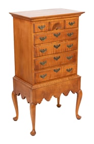DIMINUTIVE ELDRED WHEELER TIGER MAPLE CHEST-ON-FRAME Massachusetts, 20th Century Height 42.5". Width