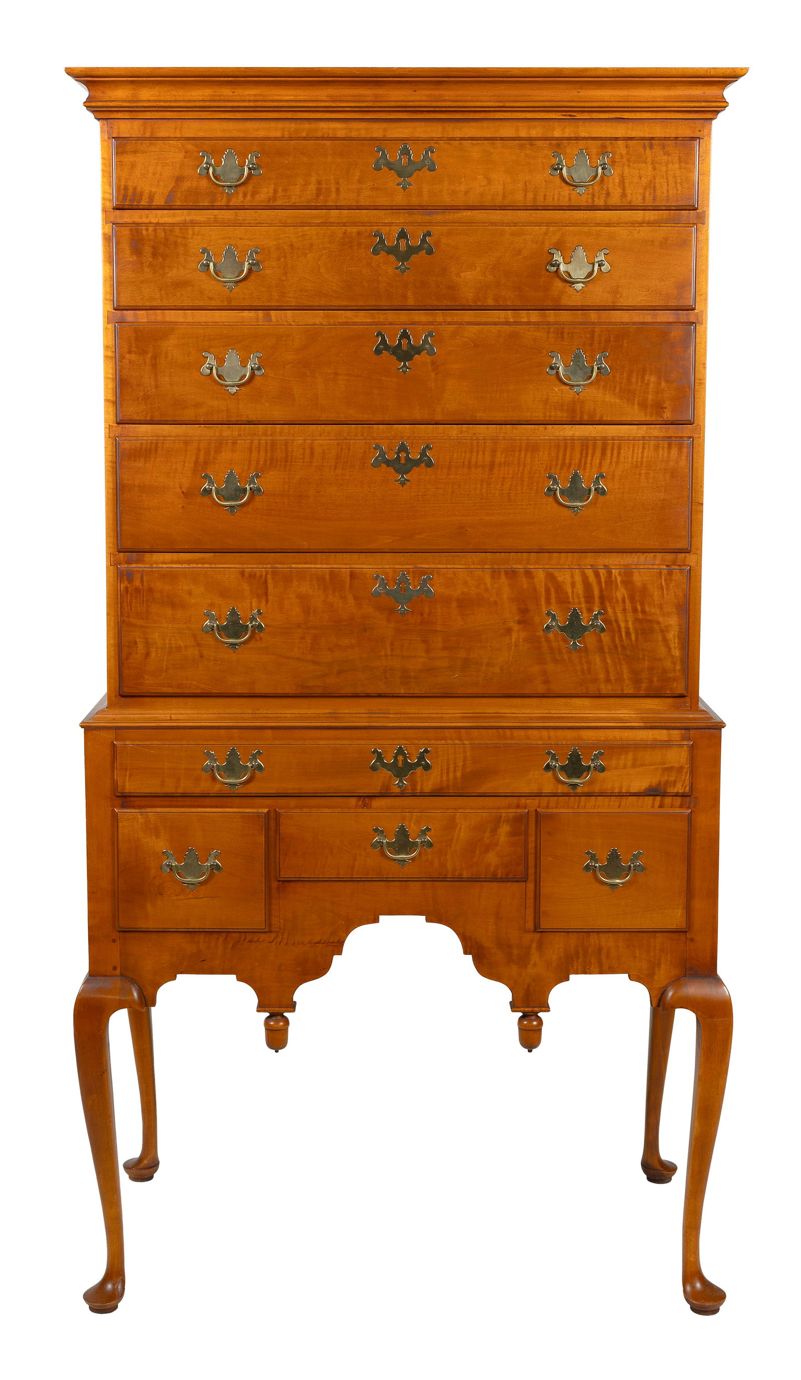 ELDRED WHEELER QUEEN ANNE-STYLE TIGER MAPLE HIGHBOY Massachusetts, 20th Century Height 71". Width: ELDRED WHEELER QUEEN ANNE-STYLE TIGER MAPLE HIGHBOYMassachusetts, 20th CenturyUpper case with five graduated full-width drawers. Lower case with a full-width drawer over three side-by-side drawers, an