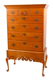 ELDRED WHEELER DUNLAP-STYLE TIGER MAPLE CHEST-ON-FRAME Massachusetts, 20th Century Height 63". Width
