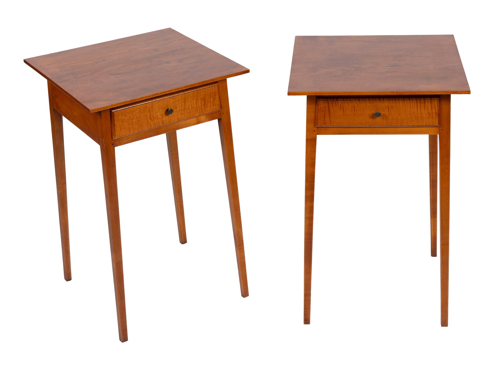 PAIR OF ELDRED WHEELER MAPLE AND TIGER MAPLE ONE-DRAWER STANDS Massachusetts, 20th Century Heights: PAIR OF ELDRED WHEELER MAPLE AND TIGER MAPLE ONE-DRAWER STANDSMassachusetts, 20th CenturyOriginal paper labels inside drawers.Heights 27.5". Widths 17.5". Depths 17.5".