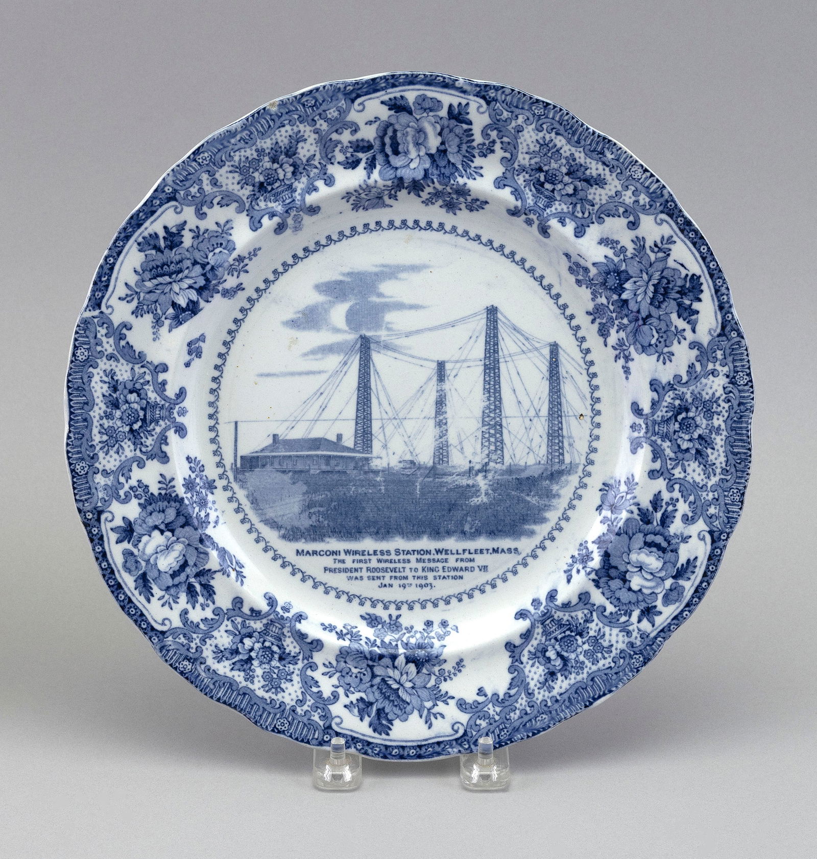 RARE WILLIAM ADAMS & CO. MARCONI WIRELESS STATION SOUVENIR PLATE England, Last Quarter of the 19th: RARE WILLIAM ADAMS & CO. MARCONI WIRELESS STATION SOUVENIR PLATEEngland, Last Quarter of the 19th CenturyBlue and white transfer decoration, including floral bouquets about the rim. Marked on base "Im