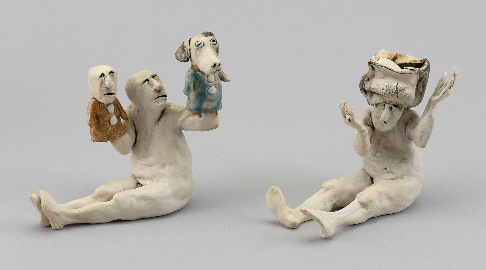 AGGIE ZED (Virginia, Contemporary), Two whimsical figures:, Clay, heights approx. 4". Lengths 5". (1 of 5)