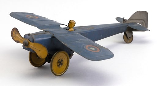 GIRARD MODEL WORKS TIN WIND-UP AIRPLANE Pennsylvania, Circa 1930 Length 13".