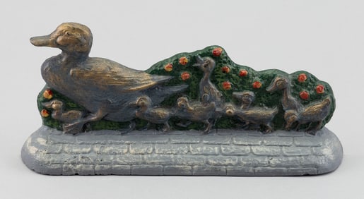 CAST IRON MAKE WAY FOR DUCKLINGS DOORSTOP Late 20th Century Height 4.5". Length 9.5".