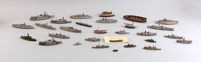 COLLECTION OF 26 MINIATURE CARVED SHIPS AND CARVING KNIFE Early 20th Century Model lengths to 6".