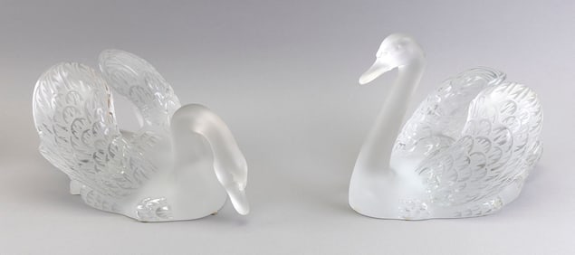 TWO LALIQUE CRYSTAL SWANS France, 20th Century Heights 9" and 10". Length 13".