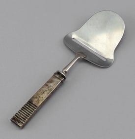 STERLING SILVER CHEESE PLANE ATTRIBUTED TO GEORG JENSEN Denmark, 20th Century Length 8".