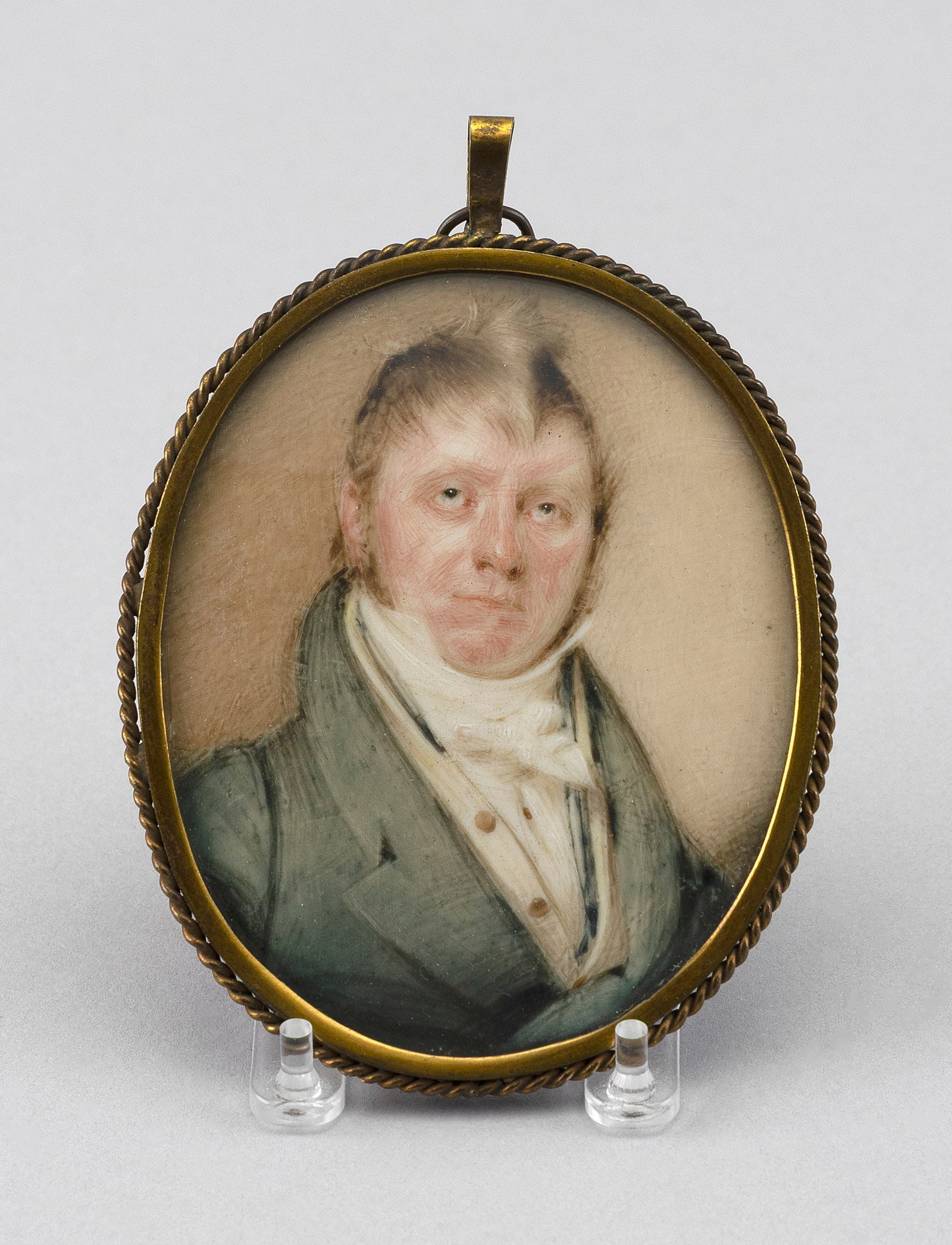 ATTRIBUTED TO JOHN COMERFORD (Ireland, Late 18th/Early 19th Century), Portrait miniature on ivory of (1 of 2)