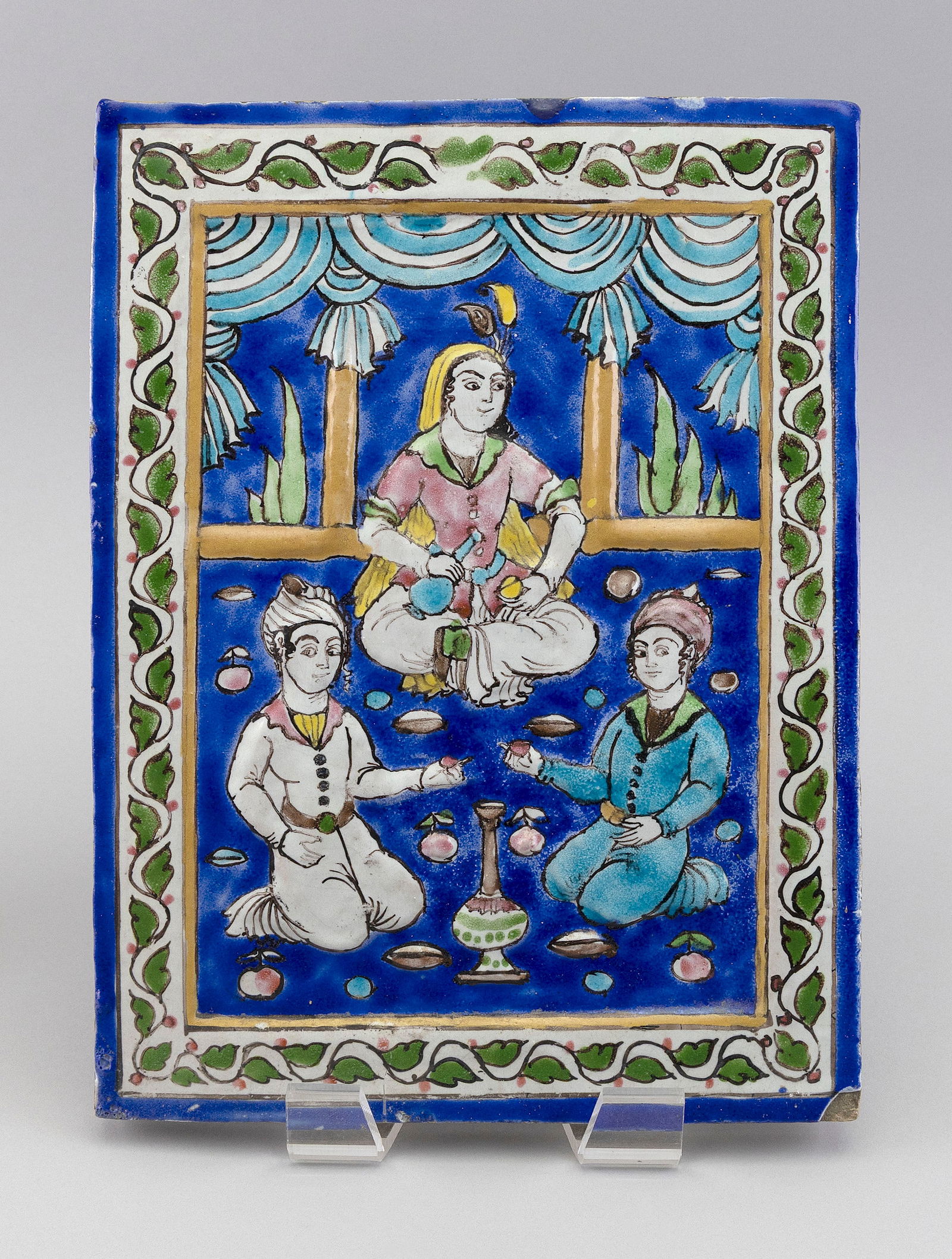INDO-PERSIAN CERAMIC TILE PLAQUE Late 19th/Early 20th Century 14.25" x 10.75".: INDO-PERSIAN CERAMIC TILE PLAQUELate 19th/Early 20th CenturyFigural scene.14.25" x 10.75".