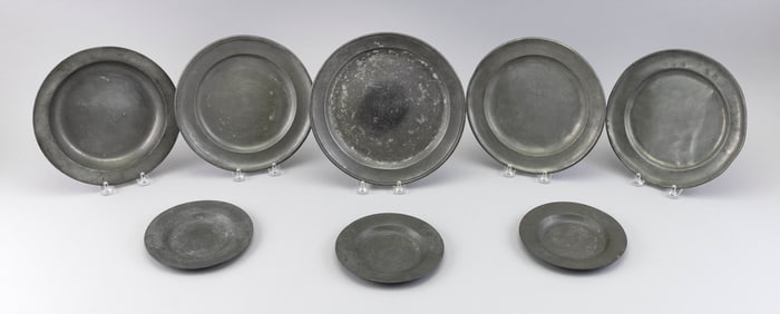 EIGHT PEWTER PLATES, MOSTLY ENGLISH 18th/Early 19th Century Diameters from 6" to 9.75".
