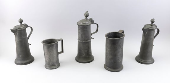 FIVE PEWTER DRINKING VESSELS 19th Century Heights from 7" to 13.5".