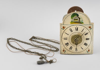 BLACK FOREST SURRERWERK WALL CLOCK Germany, 19th Century Height 7". Width 5.5". Depth 4".