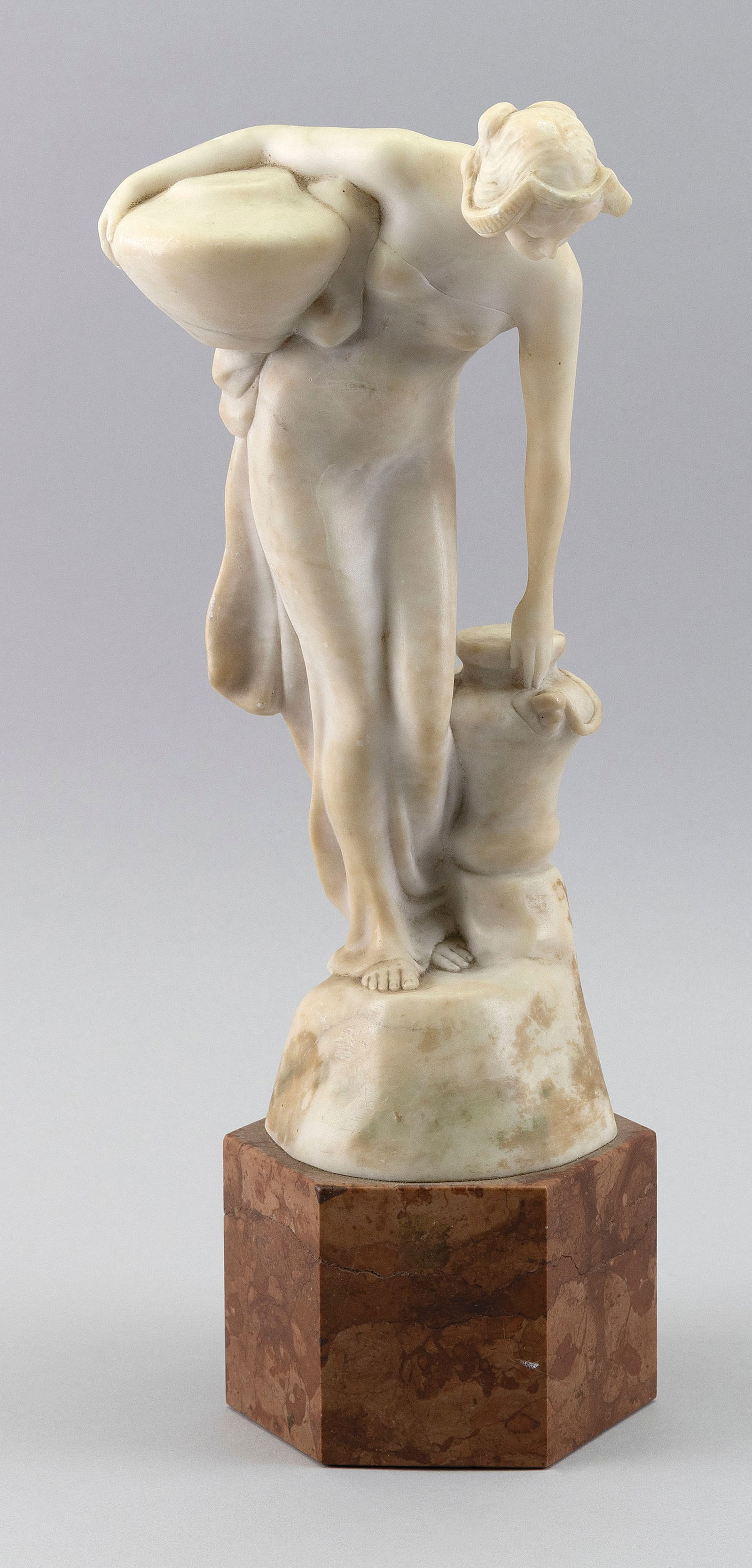 FRIEDRICH GOLDSCHEIDER (Austria/France, 1845-1897), Classical maiden., Marble, height 12". Total: FRIEDRICH GOLDSCHEIDERAustria/France, 1845-1897Classical maiden. Artist's gold seal and numbered "2754H24" on hexagonal rouge marble base.Marble, height 12". Total height 15".