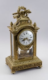 FRENCH EMPIRE GILT BRONZE SHELF CLOCK IN THE STYLE OF FERDINAND BARBEDIENNE 19th Century Height 19".