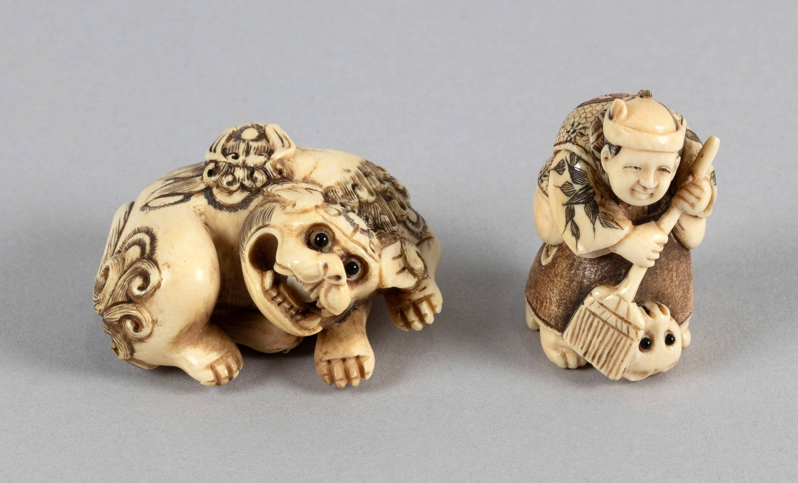 TWO JAPANESE CARVED IVORY NETSUKE BY SHOZAN Late 19th Century
