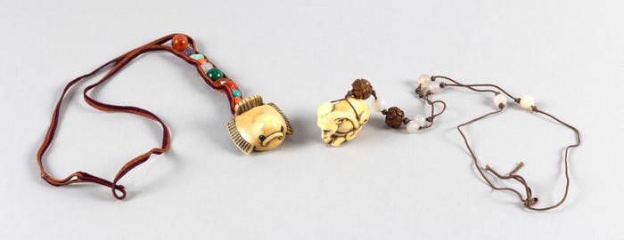 TWO JAPANESE CARVED IVORY NETSUKE STRUNG ON NECKLACES 19th Century