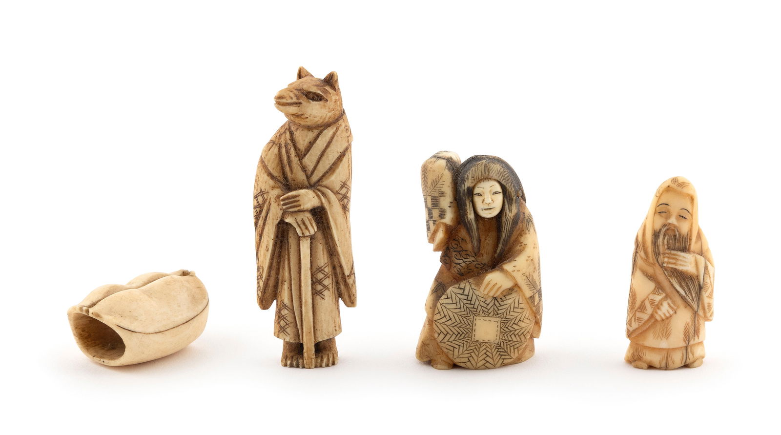 FOUR JAPANESE CARVED IVORY AND BONE NETSUKE/OKIMONO Late 19th Century Heights from 1.5" to 3".: FOUR JAPANESE CARVED IVORY AND BONE NETSUKE/OKIMONOLate 19th CenturyA trick netsuke of a Noh actor with two faces (ivory, face stuck), a netsuke of Hakuzou the fox priest (bone), a figural okimono (iv