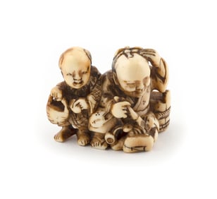 JAPANESE CARVED IVORY NETSUKE 19th Century Height 1.125". Length 1.875".