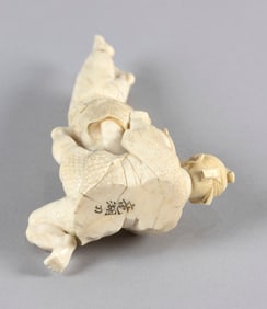 JAPANESE CARVED IVORY FIGURE GROUP Late 19th Century Height 6".