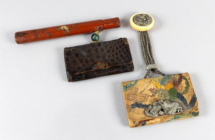 TWO JAPANESE TOBACCO POUCHES Late 19th/Early 20th Century Pouch lengths 5.25". Pipe case length
