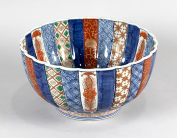 JAPANESE IMARI PORCELAIN CHRYSANTHEMUM-FORM BOWL Late 19th Century Height 6". Diameter 10".
