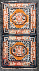 WESTERN CHINESE OR TIBETAN RUG: 2'4" X 4'6" First Half of the 20th Century