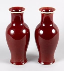 PAIR OF CHINESE SANG DE BOEUF PORCELAIN BALUSTER VASES Late 19th/Early 20th Century Heights 10".