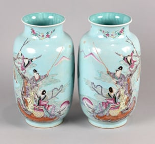 PAIR OF CHINESE FAMILLE ROSE PORCELAIN ROULEAU VASES Early 20th Century Heights 11.5". Diameter of