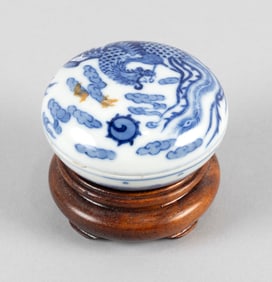 CHINESE BLUE AND WHITE PORCELAIN SEAL PASTE BOX Late 19th Century Height 1". Diameter 2.5". With