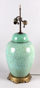 CHINESE CELADON GLAZE PORCELAIN JAR MOUNTED AS A TABLE LAMP Early 20th Century Jar height 16".