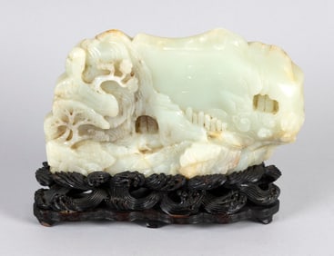 CHINESE WHITE JADE CARVING 19th Century or Earlier Jade height 6". Length 9". Stand height 2".