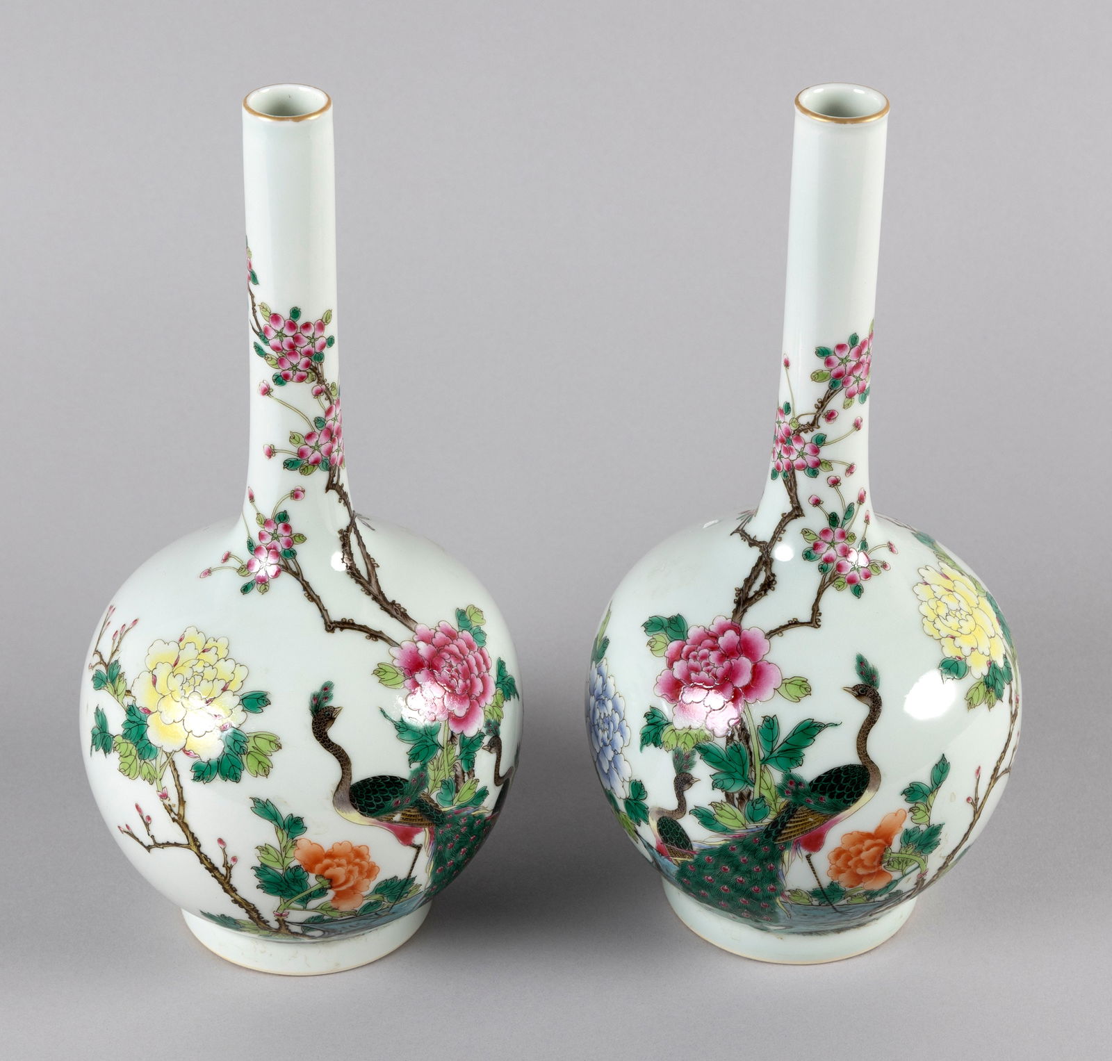 PAIR OF CHINESE FAMILLE ROSE PORCELAIN BOTTLE VASES Early 20th Century Heights 11". (1 of 3)
