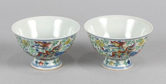 PAIR OF CHINESE DOUCAI PORCELAIN FOOTED WINE CUPS Possibly 19th Century Heights 2". Diameters 3.5".