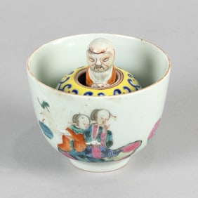 CHINESE FAMILLE ROSE PORCELAIN TRICK CUP Late 19th Century Height 2.5". Diameter 3.5".