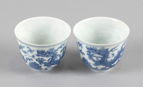 PAIR OF CHINESE BLUE AND WHITE PORCELAIN WINE CUPS Late 19th/Early 20th Century Heights 2". Widths