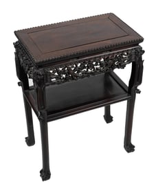CARVED CHINESE HARDWOOD TABLE Late 19th/Early 20th Century Height 27.5". Width 21". Depth 12.5".