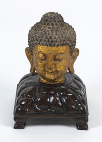 THAI GILT AND BLACK PAINTED BUDDHA HEAD 19th Century Head height approx. 12". Width across ears 8".