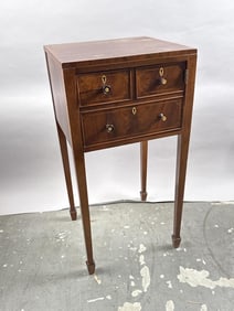 HEPPLEWHITE-STYLE MAHOGANY AND MAHOGANY VENEER TABLE Late 19th/Early 20th Century Height 30". Width