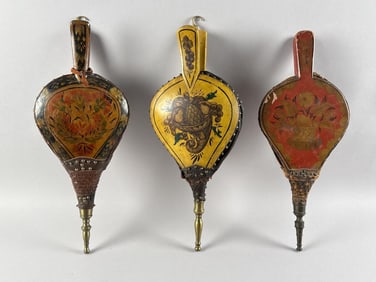 THREE PAINT-DECORATED BELLOWS 19TH Century Lengths 18". Widths 7.5". Depths 2.75".