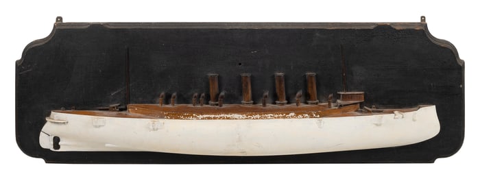 MOUNTED HALF HULL MODEL OF A STEAMSHIP First Quarter of the 20th Century Backboard 18.5" x 59".