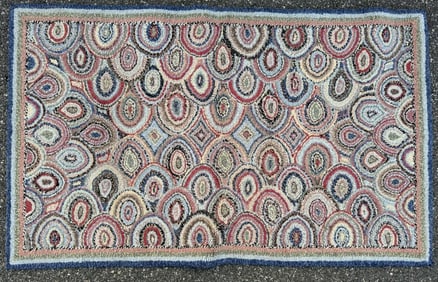 CONTEMPORARY HOOKED RUG WITH BULL'S-EYE DESIGN 60" x 36".