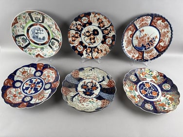 SIX JAPANESE IMARI PORCELAIN CHARGERS Late 19th/Early 20th Century Diameters from 11.5" to 12.5".