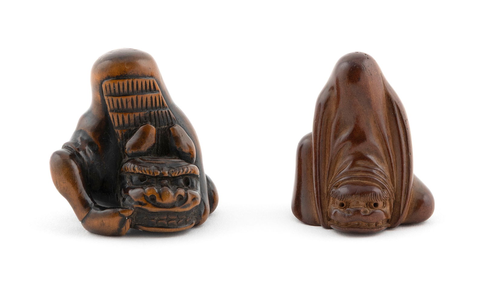 TWO JAPANESE CARVED WOOD NETSUKE Early 20th Century Heights approx. 1.5". (1 of 5)