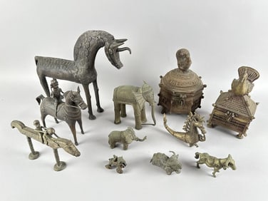 ELEVEN INDIAN, INDO-PERSIAN AND OTHER METAL ANIMAL FIGURES AND BOXES Late 19th/Early 20th Century