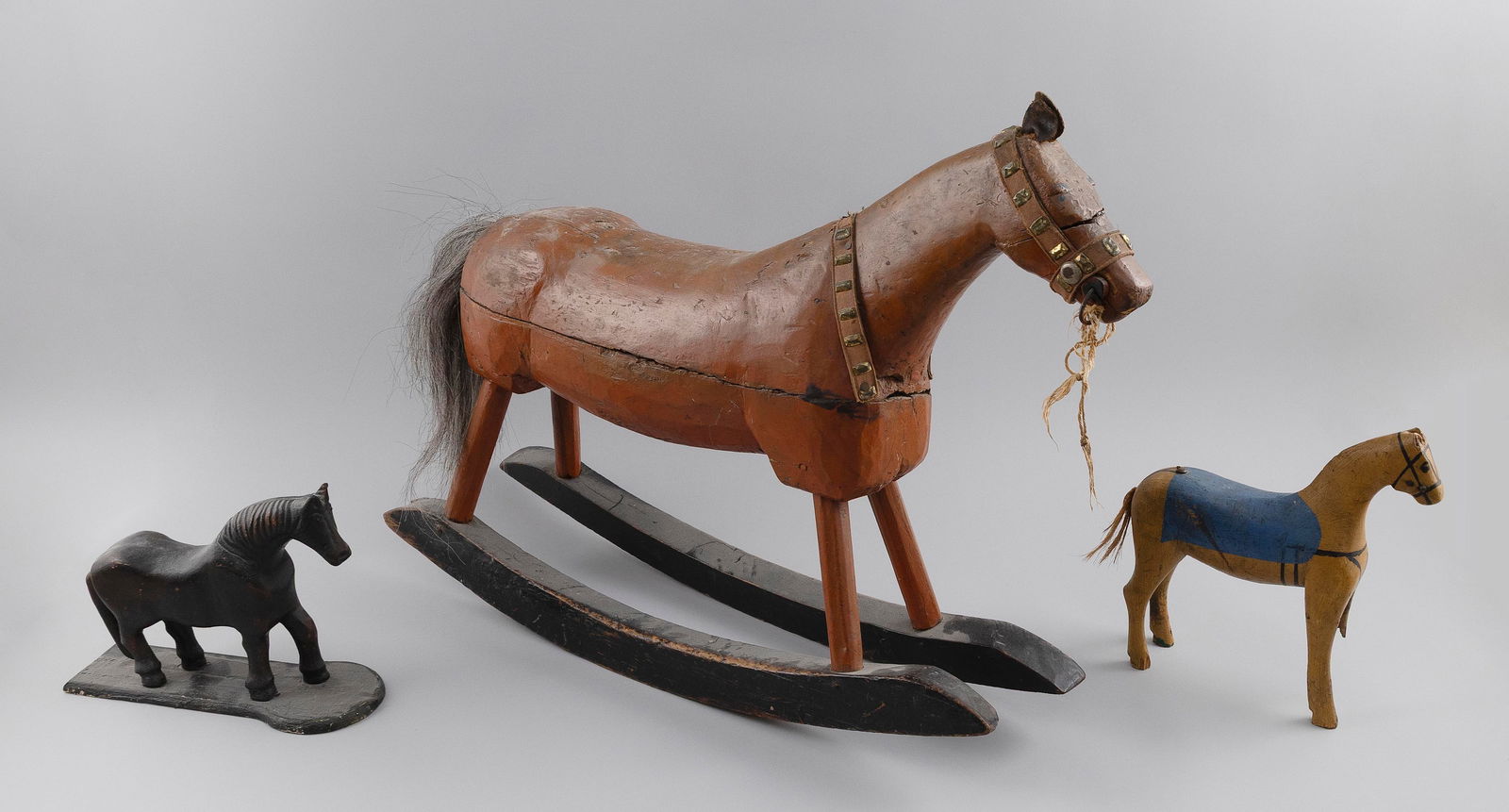 THREE CARVED WOODEN HORSES 19th Century Heights 8", 10" and 20". (1 of 2)