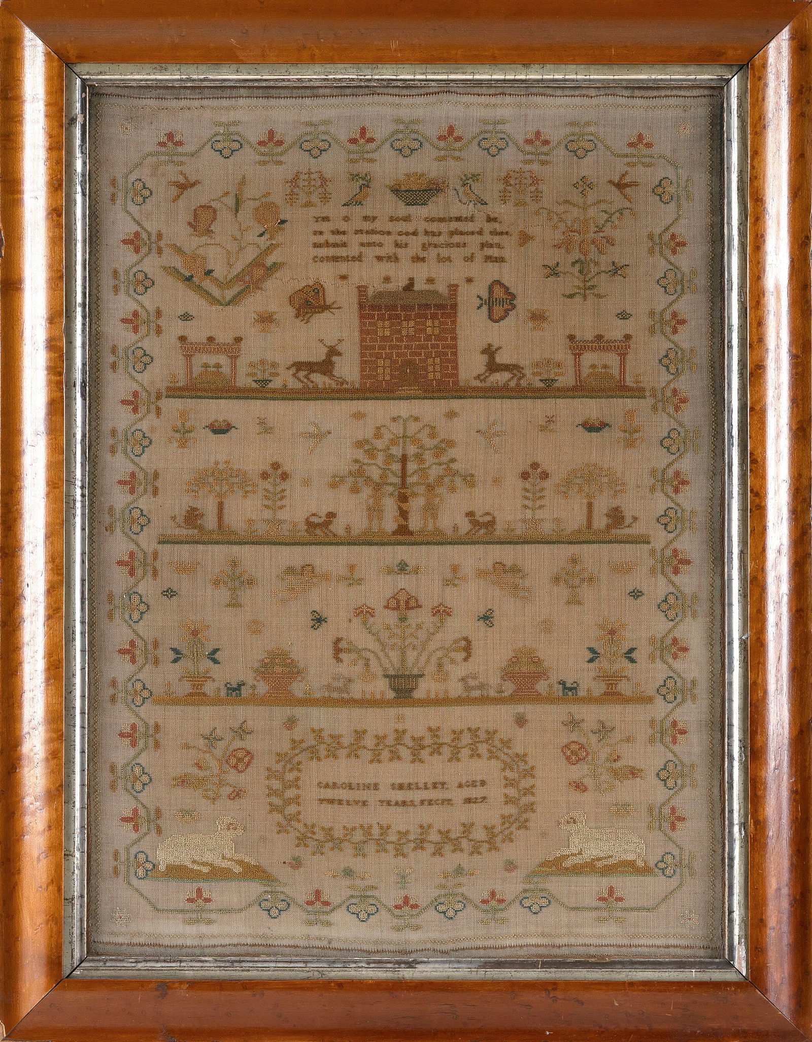 PICTORIAL NEEDLEWORK SAMPLER Dated 1827 18" x 13" sight. Framed 21.5" x 17".: PICTORIAL NEEDLEWORK SAMPLERDated 1827Wrought by "Caroline Shelley Aged Twelve Years, Fecit, 1827". Depicts songbirds, baskets of fruit, a brick house, insects, animals, Adam and Eve, angels etc. surr
