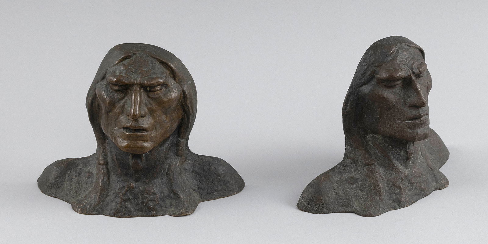 PAIR OF BRONZE NATIVE AMERICAN BOOKENDS Early 20th Century Heights 5.25". (1 of 2)