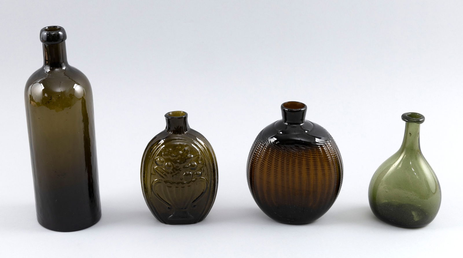 FOUR AMBER GLASS BOTTLES 19th Century Heights 5", 5.5" and 9". (1 of 7)